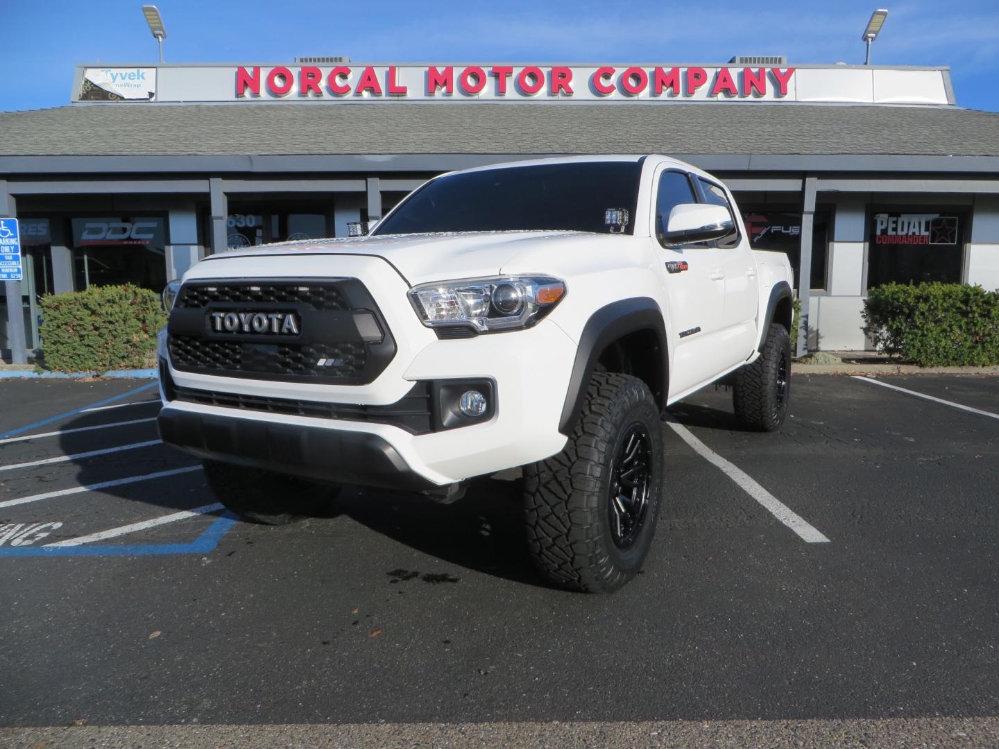 2019 White /black Toyota Tacoma TRD OFF-ROAD Double Cab (3TMAZ5CN4KM) with an 3.5L engine, automatic transmission, located at 2630 Grass Valley Highway, Auburn, CA, 95603, (530) 508-5100, 38.937893, -121.095482 - TRD Offroad 2WD sitting on Fox 2.5 remote reservoir DSC Coil-overs, Total Chaos upper control arms, Rigid Industries Dually side shooter leds, Fuel Rebel wheels, Nitto Ridge Grappler tires, and window tint. - Photo#0